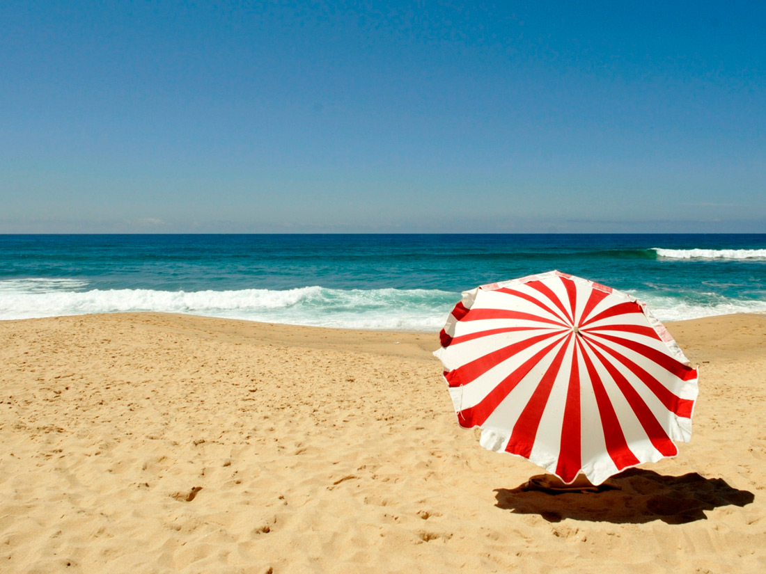 Sunny Beach with Red lines umbrella